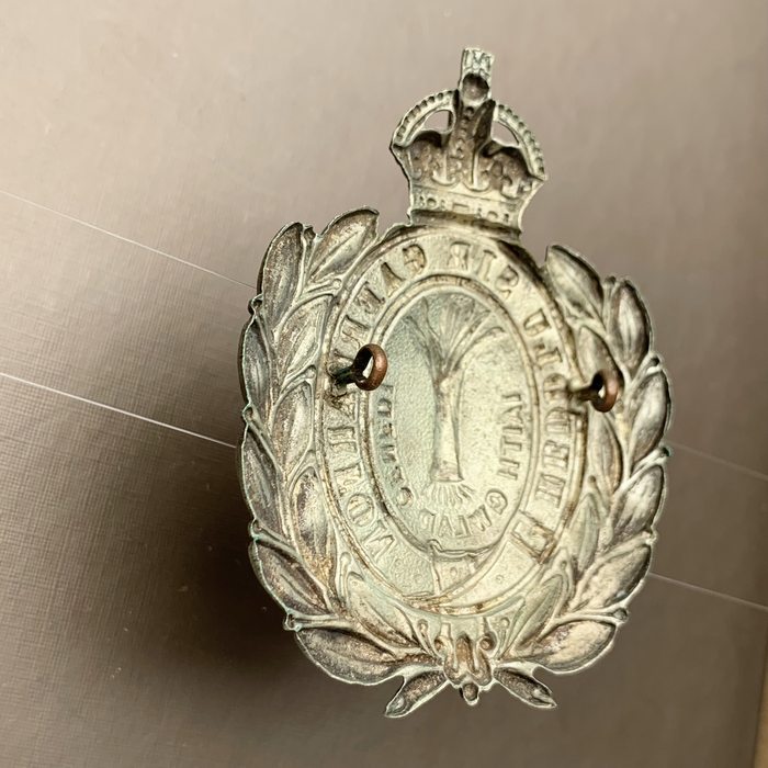 British Police Caernarvonshire Constabulary Wreath Helmet Plate - King's Crown